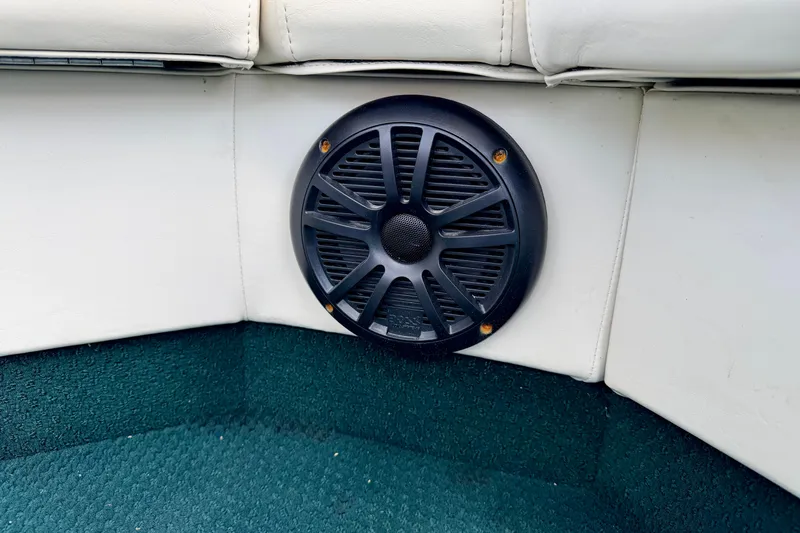 Slide: The Image of Boat speaker on Bennington 2050 LX, 2001 model, with white upholstery and green carpet. - 57