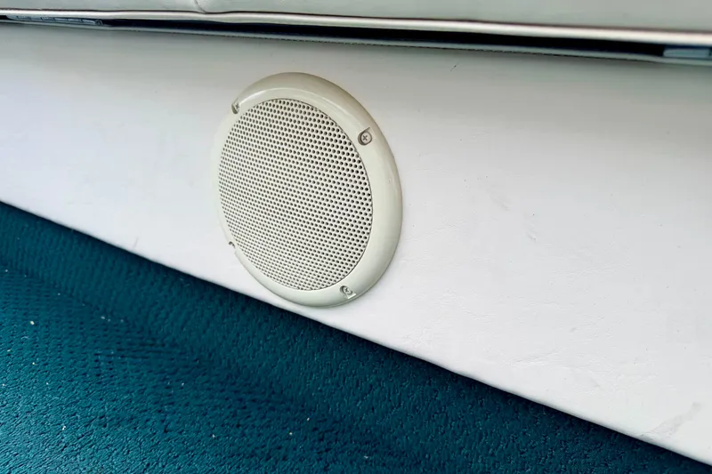 Slide: The Image of White speaker on a Bennington 2050 LX boat, 2001 model, with teal carpet. - 58