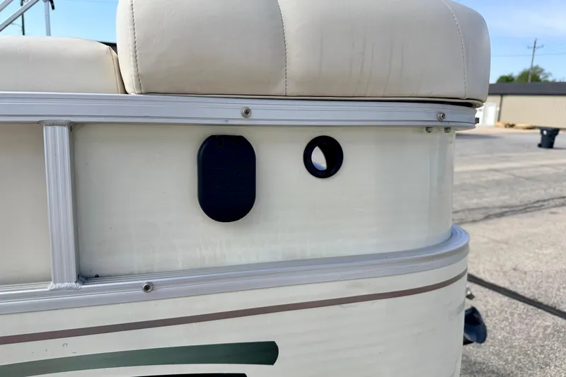 Slide: The Image of 2001 Bennington 2050 LX boat detail showing side panel and seating. - 65