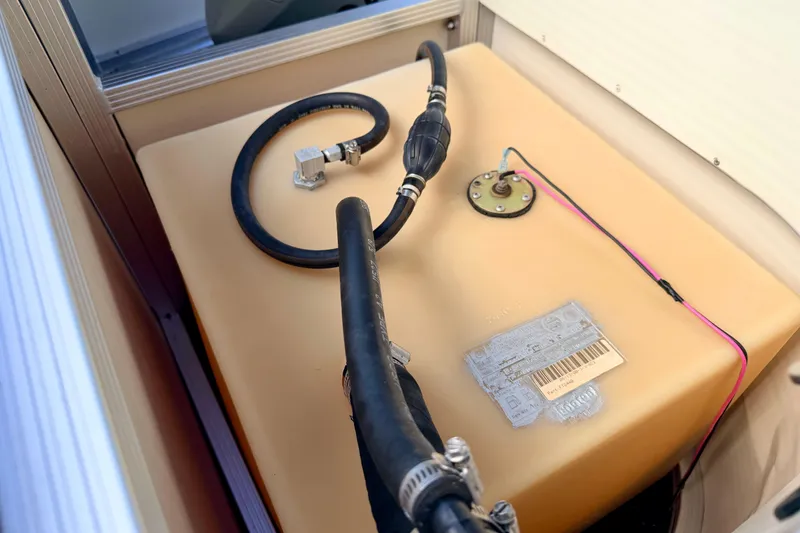 Slide: The Image of Fuel tank of a 2001 Bennington 2050 LX boat with attached hoses and wiring. - 66
