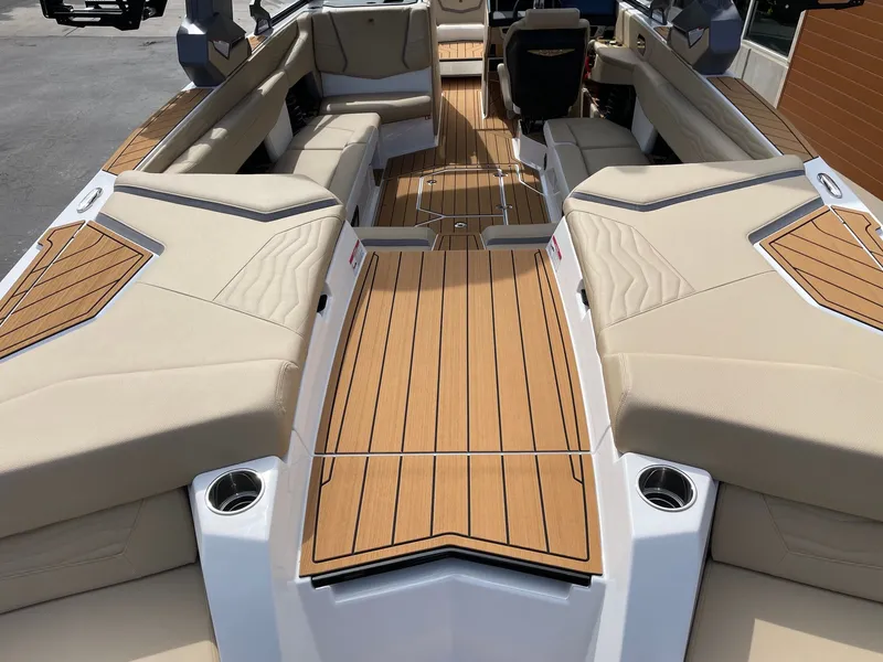 Slide: The Image of Interior of 2026 Nautique G25 with luxurious seating area. - 4