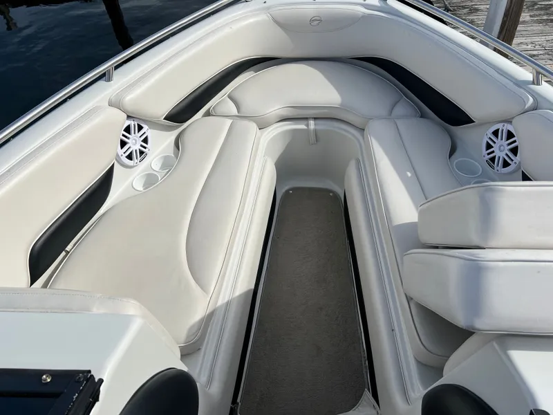 Slide: The Image of Interior of a 2003 Crownline 225 LPX boat with white seating. - 16