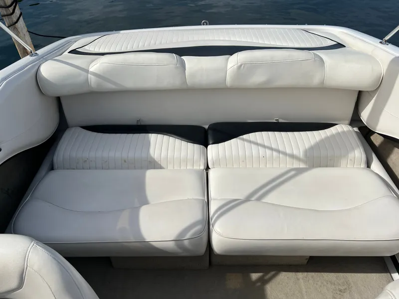 Slide: The Image of White leather seats on a 2003 Crownline 225 LPX boat. - 6