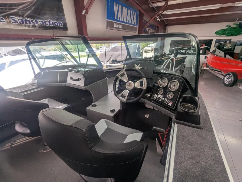 Slide: The Image of Interior of a 2026 G3 AV1850SF boat with modern steering console. - 6