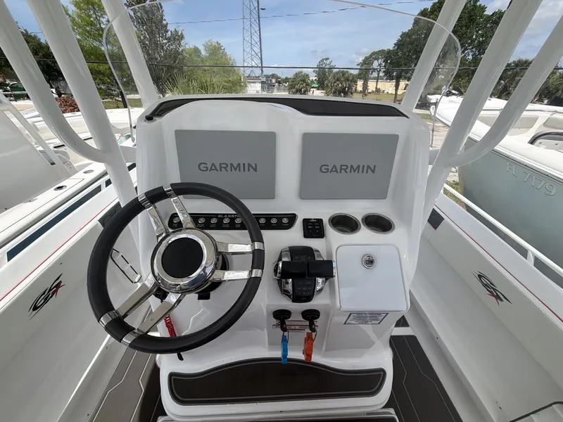 Slide: The Image of 2024 Glasstream 280 SCX boat console with Garmin technology. - 11