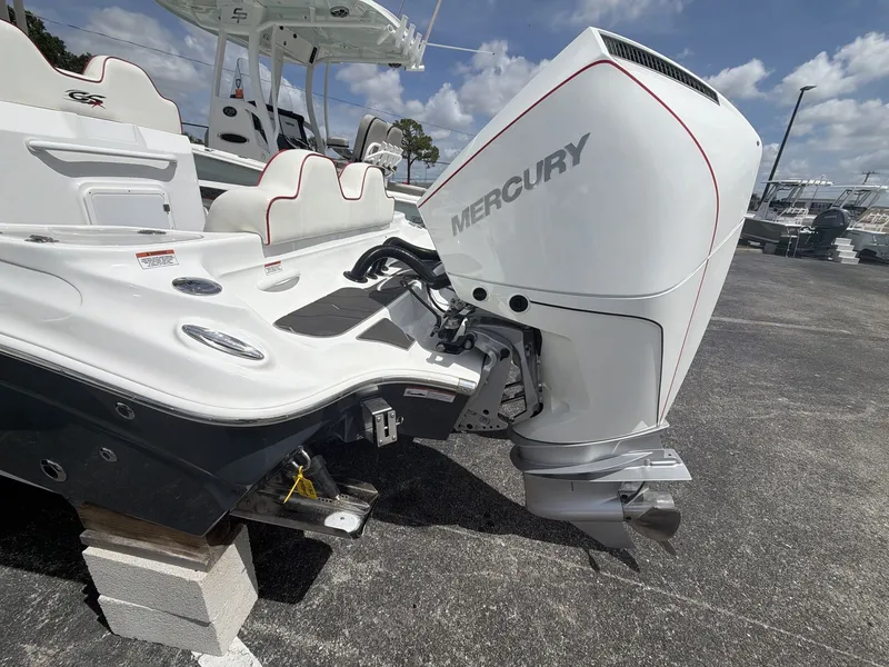 Slide: The Image of Glasstream 280 SCX 2024 with Mercury outboard motor on display. - 4