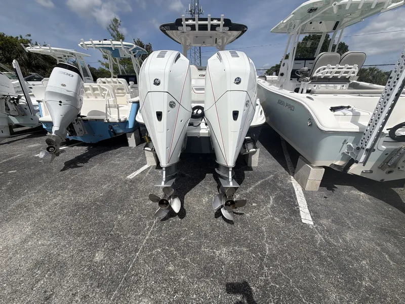 Slide: The Image of 2024 Glasstream 280 SCX boat with dual outboard engines. - 5