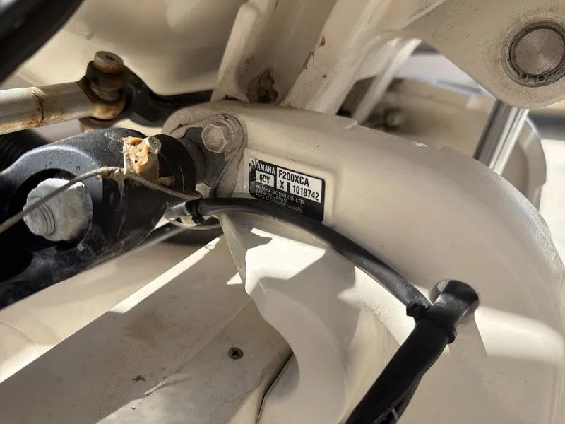 Slide: The Image of Close-up of Yamaha F200XCA engine on a Grady-White Freedom 275 boat. - 15