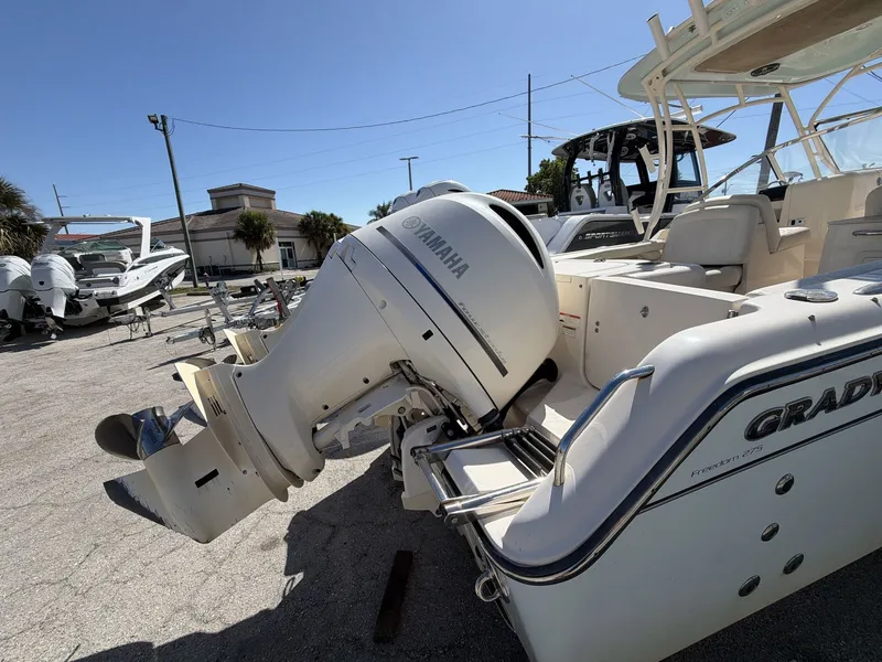Slide: The Image of 2022 Grady-White Freedom 275 boat with Yamaha outboard motor. - 19