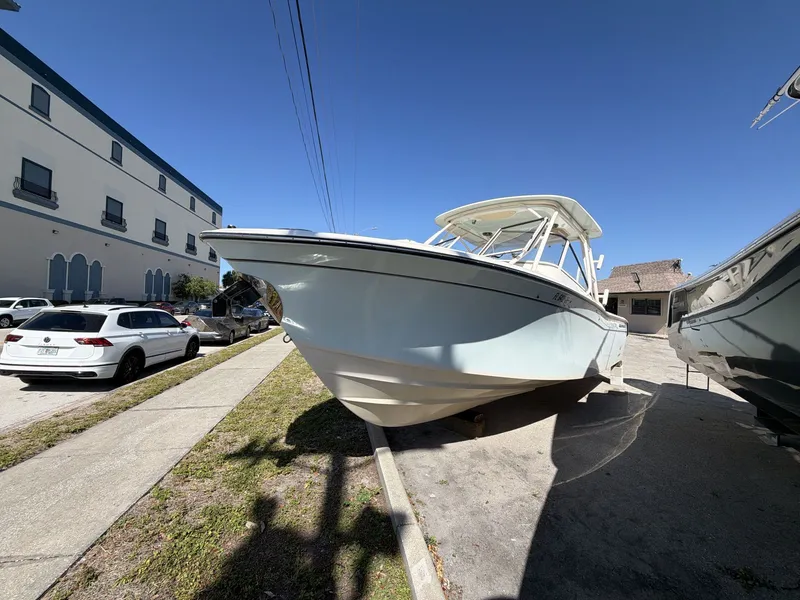 Slide: The Image of 2022 Grady-White Freedom 275 boat parked outdoors. - 3