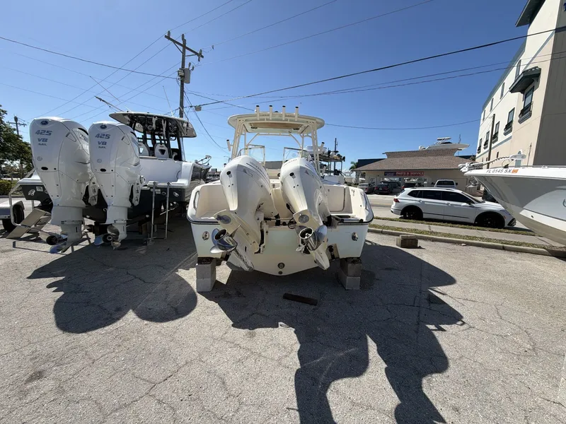 Slide: The Image of Grady-White Freedom 275 boat, 2022 model, with dual outboard engines. - 6