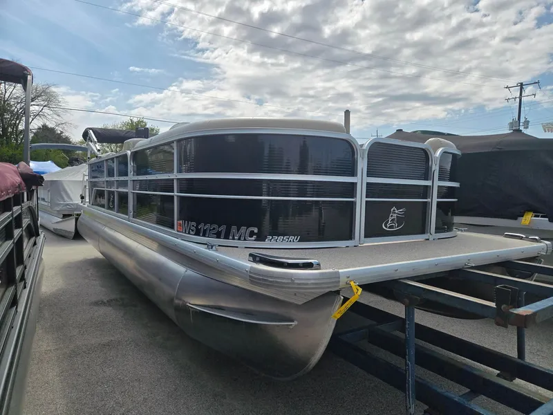 The Image of 2017 Misty Harbor 2285 pontoon boat on a trailer. - 1