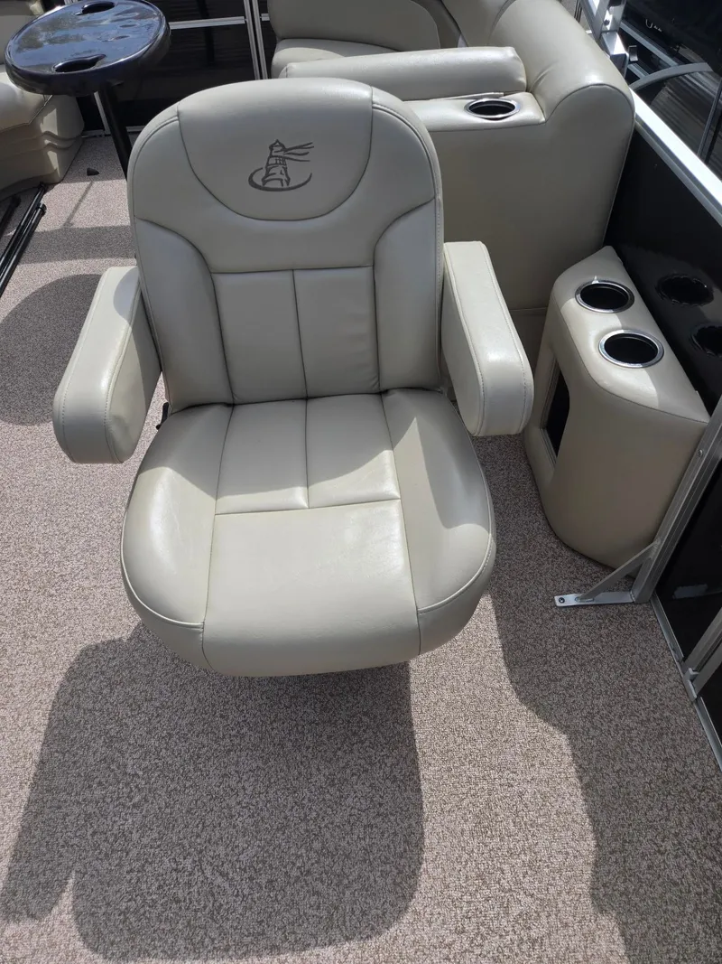 Slide: The Image of Beige leather seat on a 2017 Misty Harbor 2285 boat. - 11