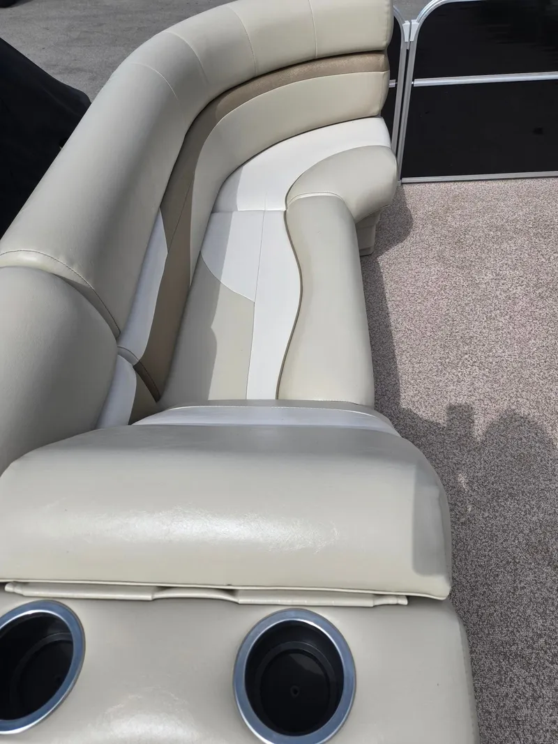 Slide: The Image of Interior of a 2017 Misty Harbor 2285 pontoon boat with beige seating. - 21