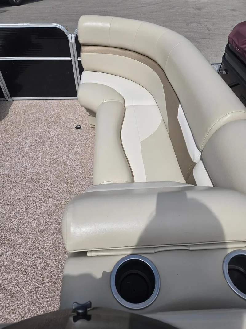 Slide: The Image of Interior of a 2017 Misty Harbor 2285 pontoon boat with beige seating. - 22