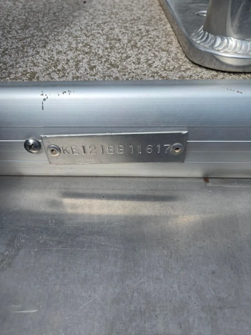 Slide: The Image of Metal plate with serial number on Misty Harbor 2285, year 2017. - 23