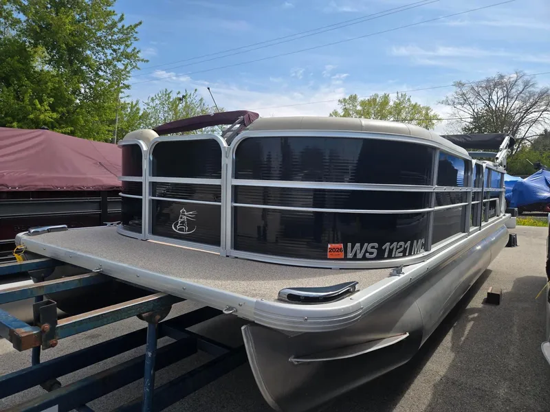 Slide: The Image of 2017 Misty Harbor 2285 pontoon boat on trailer outdoors. - 3