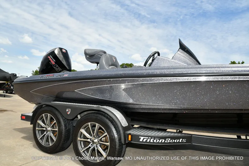Slide: The Image of 2024 Triton 20XP Patriot boat on trailer, side view. - 18
