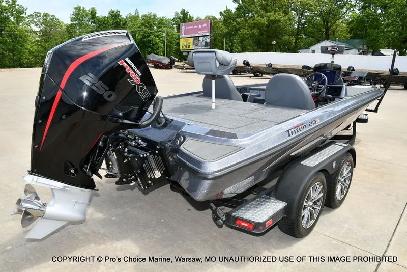 Slide: The Image of 2024 Triton 20XP Patriot boat with Mercury Pro XS engine. - 19