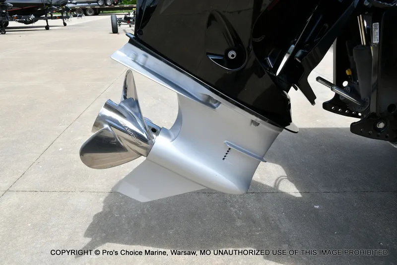 Slide: The Image of 2024 Triton 20XP Patriot outboard motor with shiny propeller. - 24