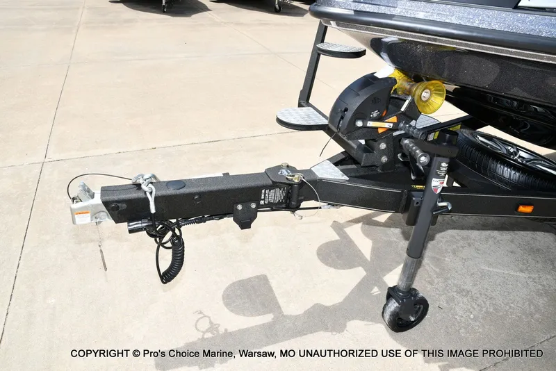 Slide: The Image of Trailer of Triton 20XP Patriot 2024 on concrete surface. - 34