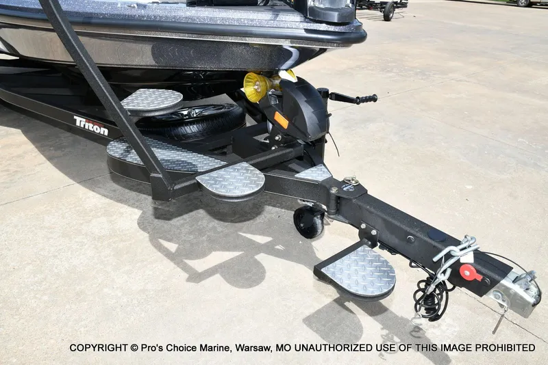 Slide: The Image of 2024 Triton 20XP Patriot boat trailer with step plates. - 35