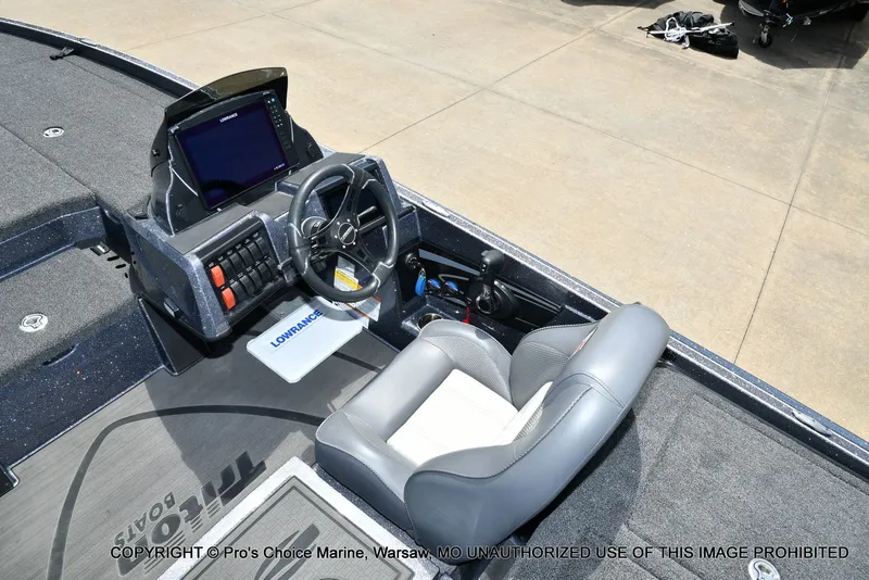 Slide: The Image of Interior of 2024 Triton 20XP Patriot with steering console. - 47