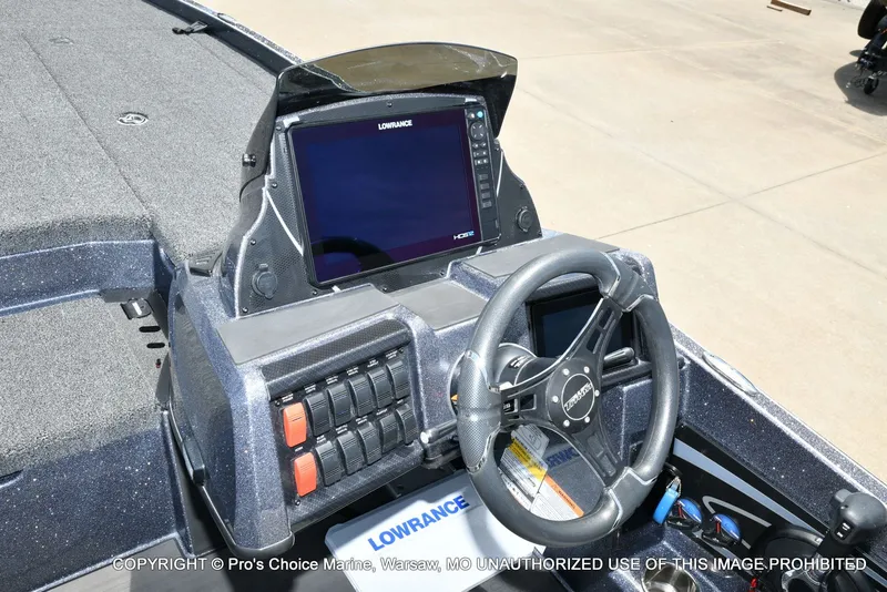 Slide: The Image of 2024 Triton 20XP Patriot boat console with Lowrance display. - 48