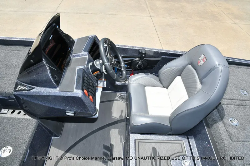Slide: The Image of Interior of 2024 Triton 20XP Patriot boat with steering console. - 49