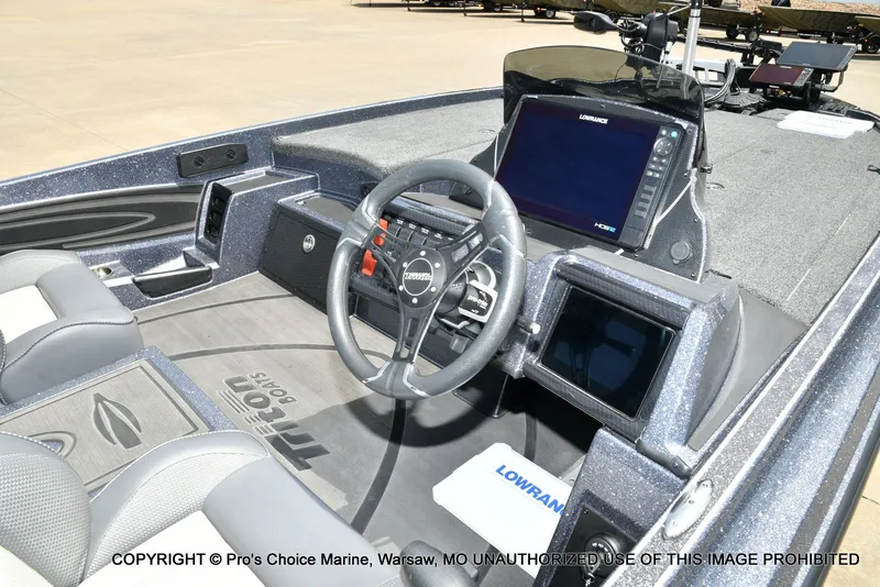 Slide: The Image of Interior of 2024 Triton 20XP Patriot boat with modern electronics. - 7