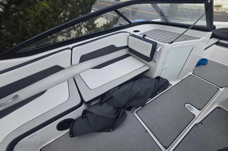 Slide: The Image of 2021 Yamaha Boats AR195 interior with sleek seating and modern design. - 11