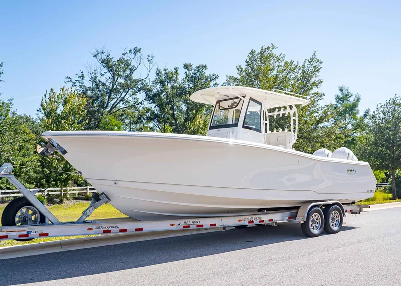 The Image of 2026 Sea Hunt Gamefish 30 on trailer, side view. - 1