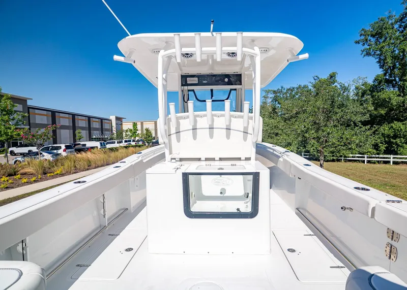 Slide: The Image of Sea Hunt Gamefish 30 Coffin Box 2026 on a sunny parking lot. - 16