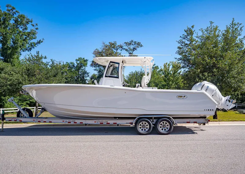 Slide: The Image of 2026 Sea Hunt Gamefish 30 on trailer, side view. - 2