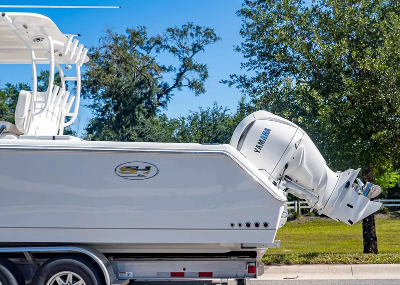 Slide: The Image of Sea Hunt Gamefish 30 boat with Yamaha engine, side view. - 3