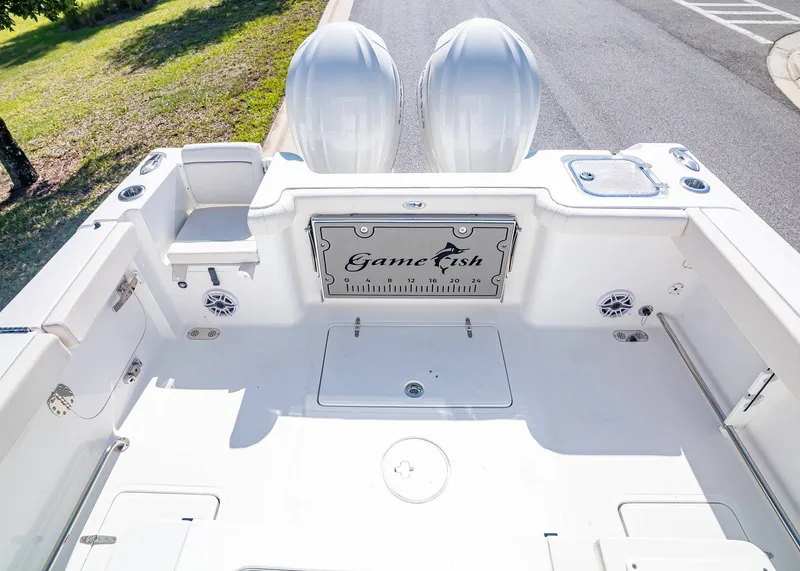 Slide: The Image of 2026 Sea Hunt Gamefish 30 boat with dual engines and spacious deck. - 8