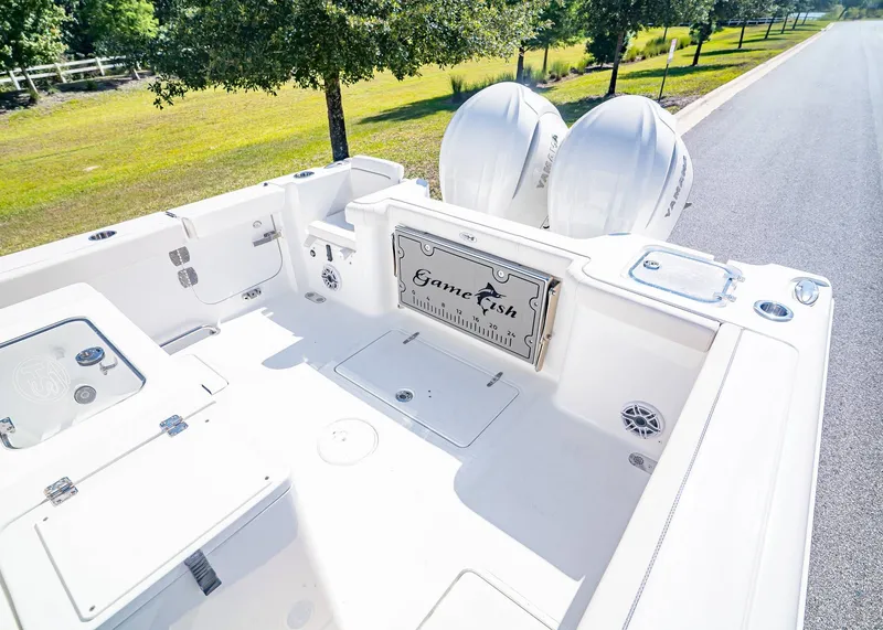 Slide: The Image of Sea Hunt Gamefish 30 Coffin Box 2026 with dual outboard engines. - 9