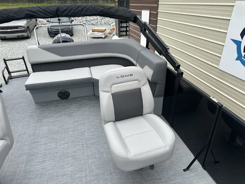 Slide: The Image of Interior of Lowe LS Walk Thru 190 boat, gray upholstery, model year 2026. - 9