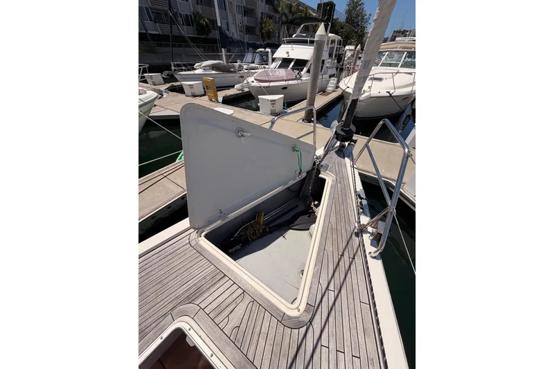 Slide: The Image of Open hatch on 2006 Hanse 461 sailboat deck at marina. - 20
