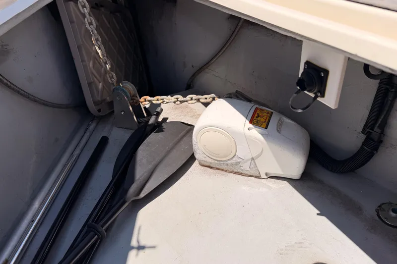 Slide: The Image of Anchor chain and winch system on a 2006 Hanse 461 sailboat deck. - 21