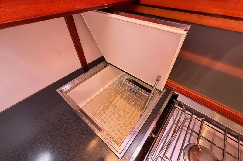 Slide: The Image of Open refrigerator in the galley of a 2006 Hanse 461 yacht. - 51