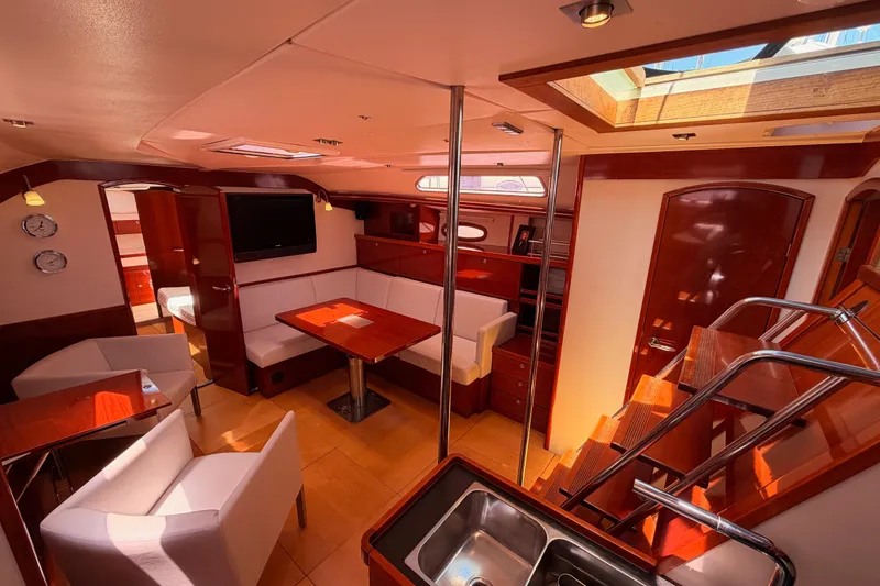 Slide: The Image of Luxurious interior of 2006 Hanse 461 yacht with elegant wood finishes and modern amenities. - 54