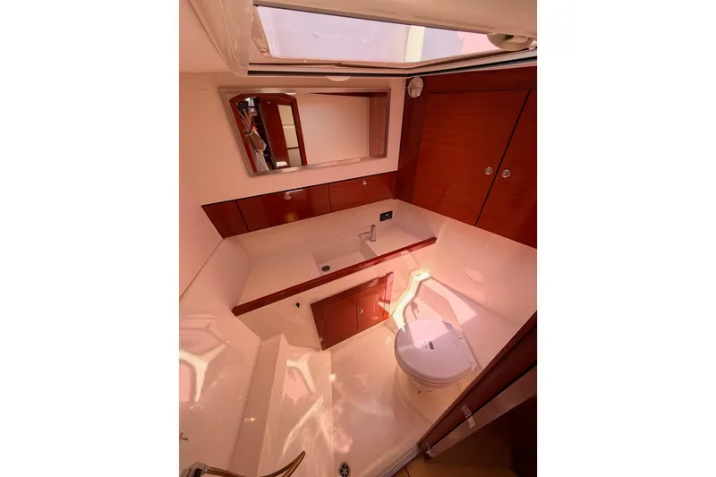 Slide: The Image of Luxurious bathroom interior of 2006 Hanse 461 yacht with wooden cabinetry and modern fixtures. - 68