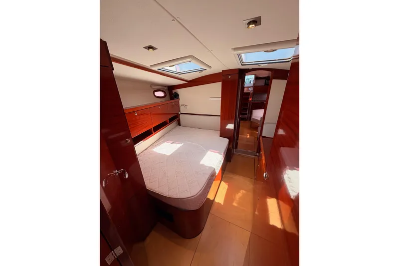 Slide: The Image of Luxurious interior of 2006 Hanse 461 yacht with wooden finishes and skylight. - 71