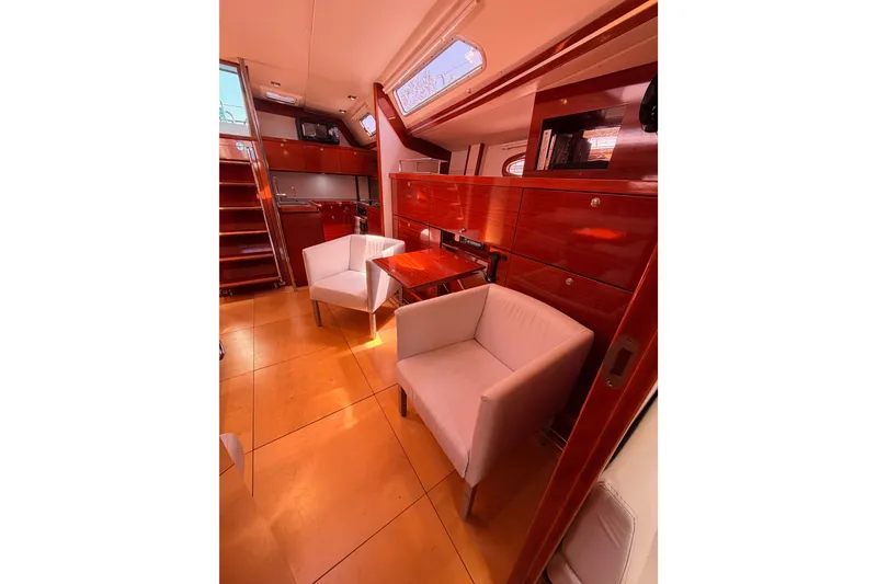 Slide: The Image of Luxurious interior of 2006 Hanse 461 yacht with elegant wood finish and modern seating. - 75