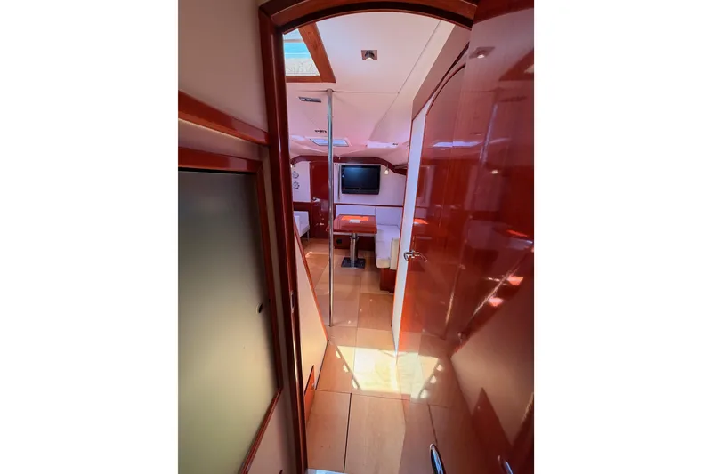 Slide: The Image of Interior view of 2006 Hanse 461 yacht, featuring polished wood and modern furnishings. - 90