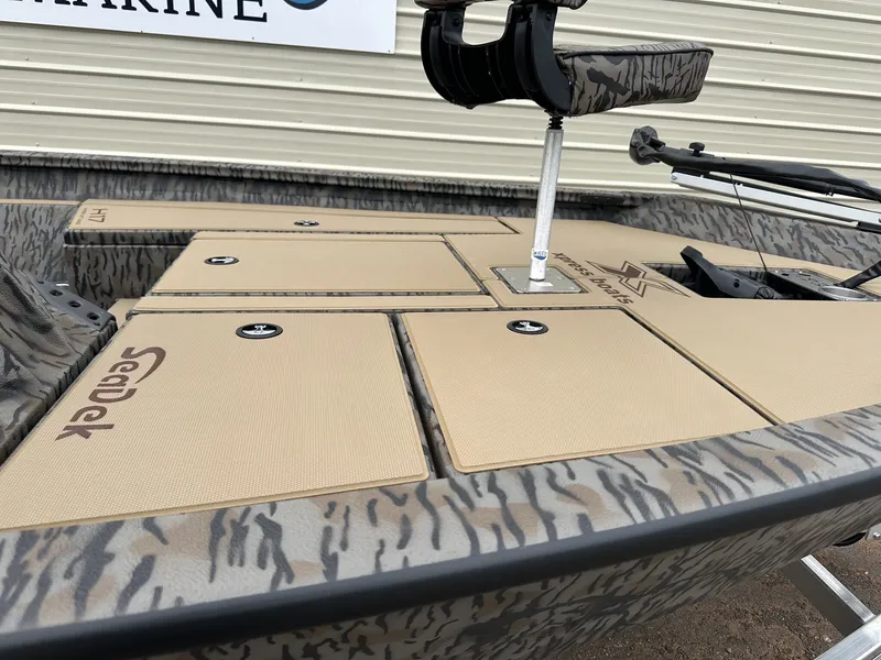 Slide: The Image of 2026 Xpress H17 boat with SeaDek flooring, close-up view. - 6