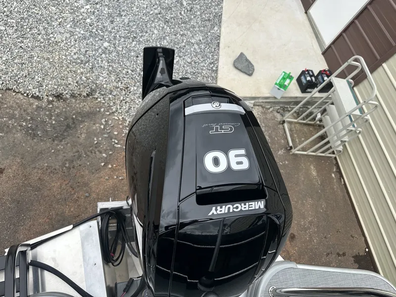Slide: The Image of Mercury 90 HP outboard motor on Lowe LS Walk Thru 190 boat. - 12
