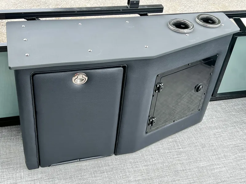 Slide: The Image of Avalon Venture 85 25' boat cabin with storage and cup holders. - 16