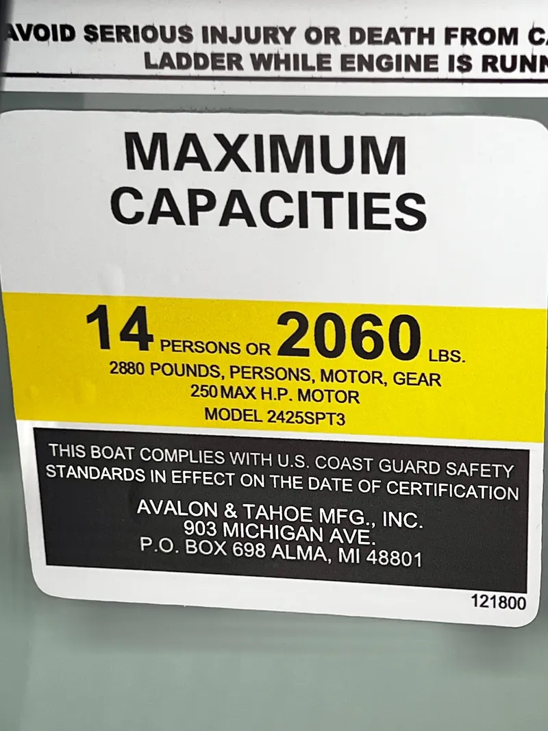 Slide: The Image of Maximum capacity sign for Avalon Venture 85 boat, 14 persons or 2060 lbs. - 26